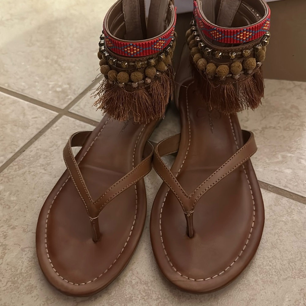 Gorgeous BoHo or Indian style high ankle sandal you can dress them up or down.